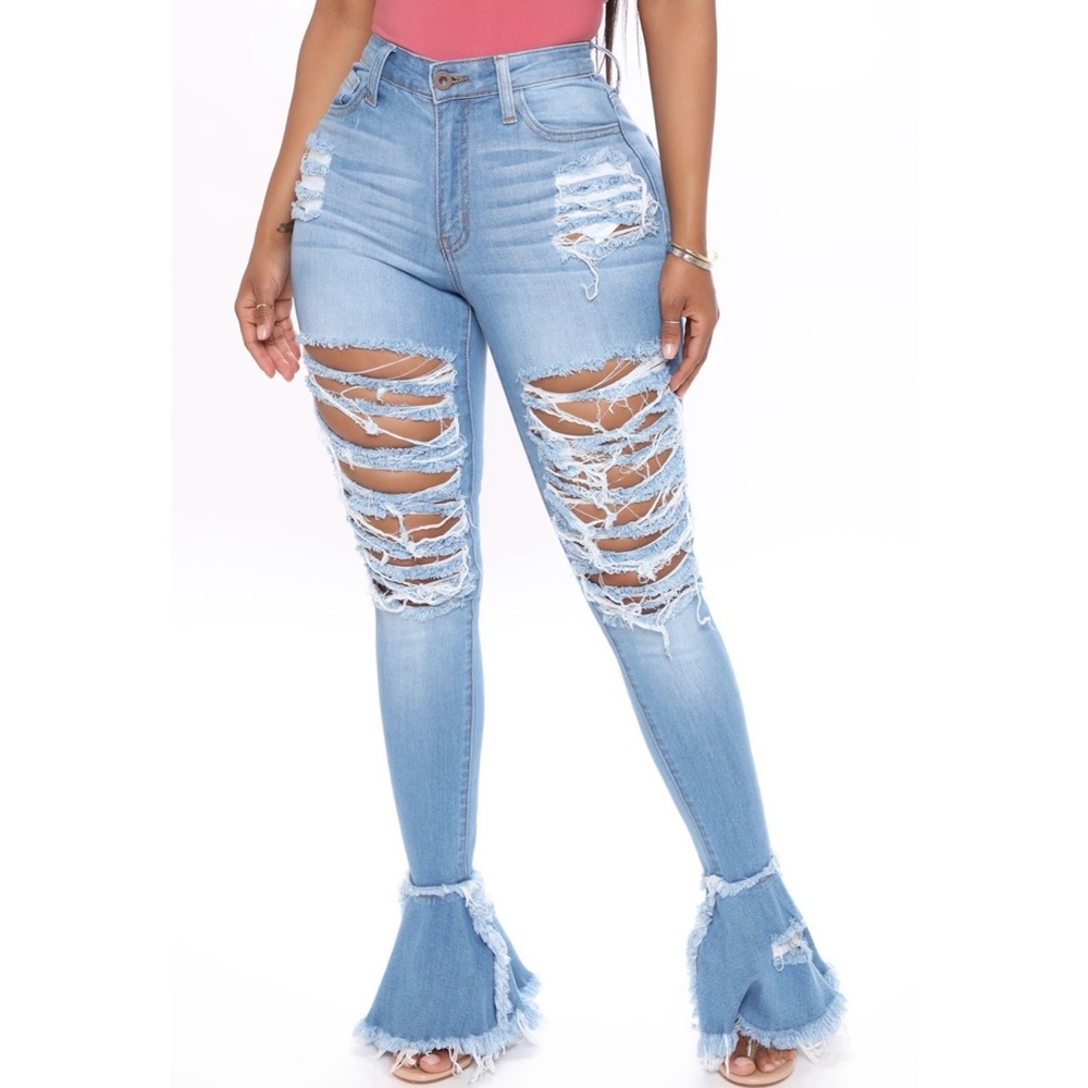 Distressed flare bottom jeans